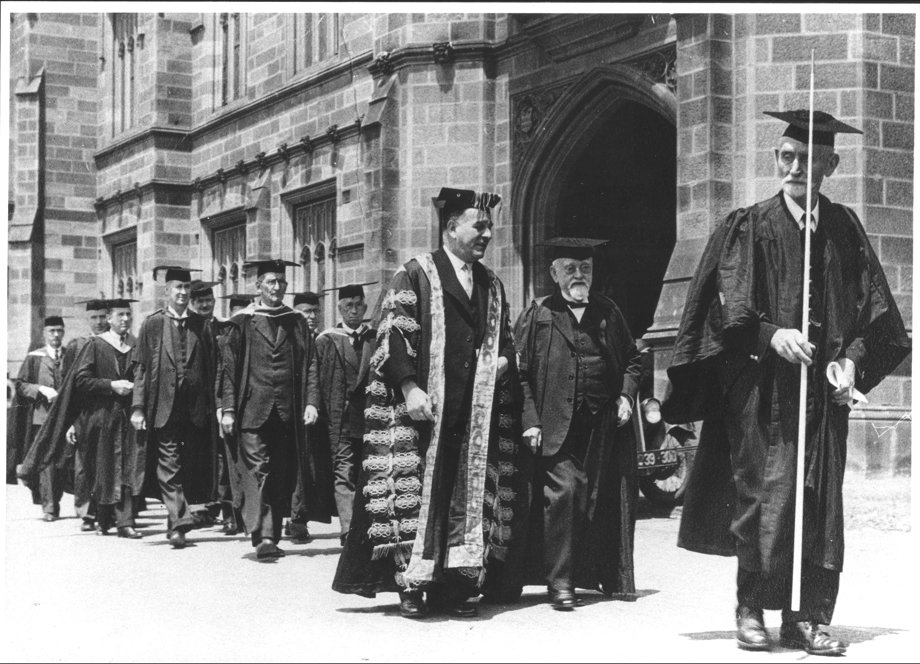 ACADEMIC PROCESSION IN FRONT OF CLOCK TOWER