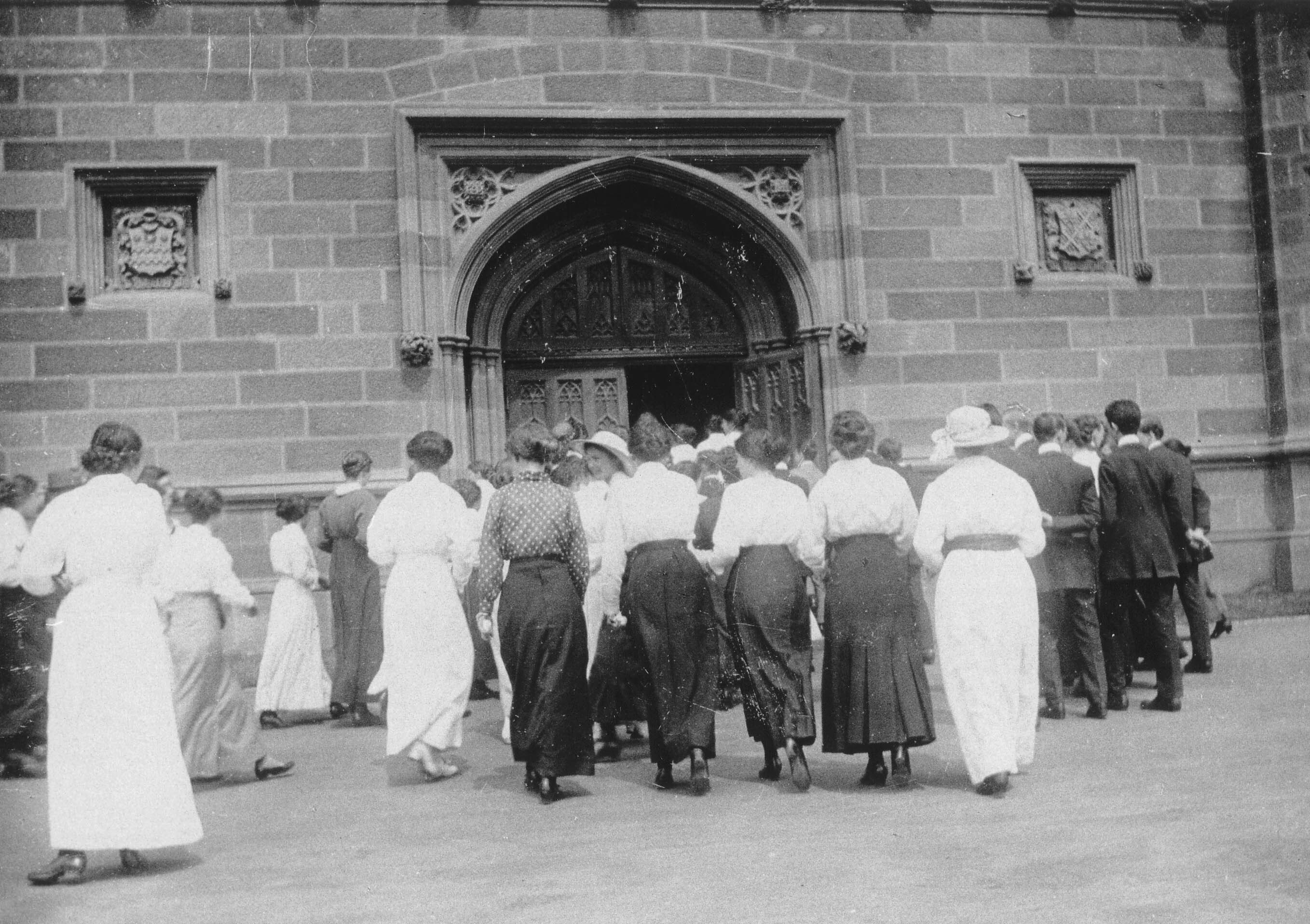 STUDENTS ENTERING GREAT HALL FOR EXAMINATIONS